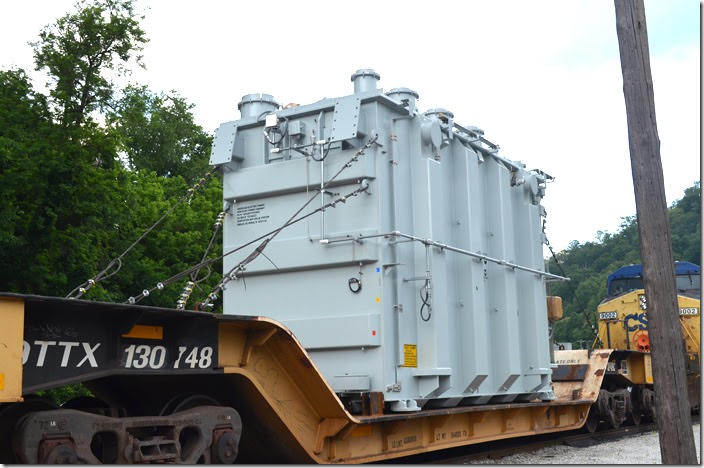 Turns out that lettering on the end says this transformer is destined for Kentucky Power’s Leslie Substation in our Hazard District. I found out later that it was to be stored temporarily on one of our lots at Pikeville KY. QTTX is a reporting mark of TTX Co. QTTX flat 130748. View 2. Shelby KY.