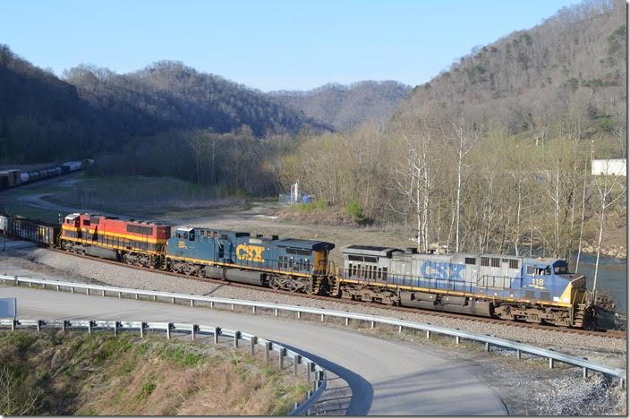 Eastbound Q693-03 is passing the reclaimed site of the Chaparral Coal tipple and approaching FO Cabin (in other words between Pikeville and Shelby). Q693 has 34 cars this day. 04-03-2018. CSX 118-201-KCS 3937. View 2. FO Cabin.