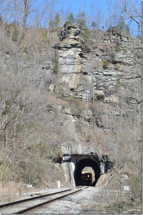 Mine run C860-03 enters Long Fork Tunnel at Virgie. This tunnel also suffered an arson fire in the 1990s. CSX 533-338-3297. Virgie KY.