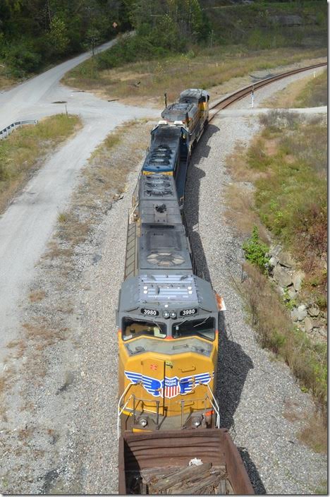 A SD70M from above. This is from a new bridge spanning the river and railroad that leads to the industrial park. UP 3980-8662-8643. FO Cabin.