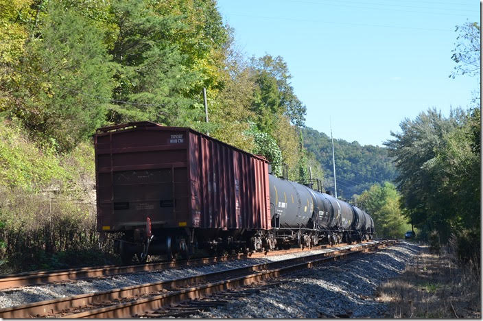 This BNSF was stenciled as a buffer car. Practically all ethanol trains we see are empty going west toward Russell. CSX 91-820. View 2. EE Pauley KY.