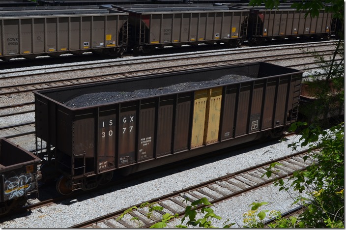 This old Bethlehem Steel coke car was full of debris at Shelby. ISGX is Arcelor Mittal now. They operate former Bethlehem mills. These used to be fairly common unit trains on the former C&O and Conrail. Around here they would haul coal, and can only be loaded to the level shown in this photo. 