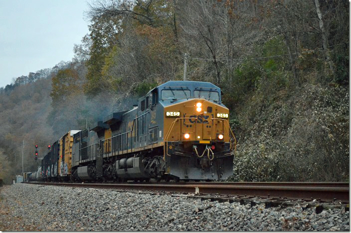 CSX 345-384 with Q692-12 westbound at the east end of Pauley with 45 cars. When the days are short you just bump up the ISO on a digital camera to get an image at 5:42 PM on a short autumn day. 11-14-2018. EE Pauley KY.
