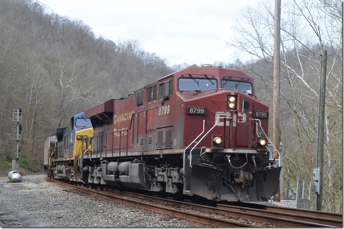 Eastbound K447-20 has 98 cars making it 13,172 tons and 5,960 feet long. CP 8799-CSX16. FO Cabin KY.