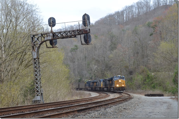 CSX 3382-954-420-3119 with a train of DKPX empty goes onto single track. FO Cabin KY.