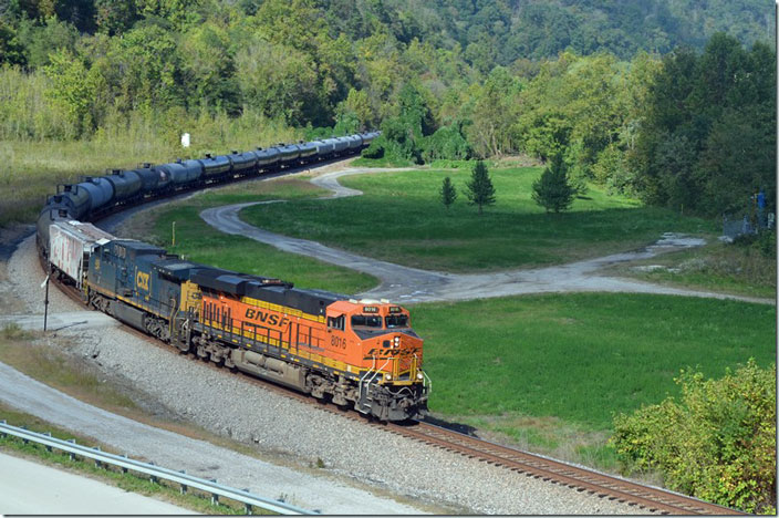 BNSF 8016 - CSX 409 on e/b ethanol K447-07 approaching FO Cabin KYwith 98 loaded tankers. 10-09-2021.
