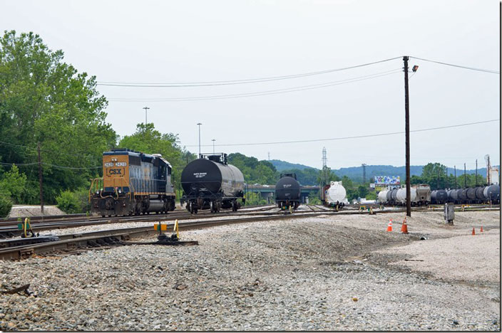 View at east end of CSX South Charleston WV yard looking west. SD40-2 2428 is the yard engine. I-64 in the distance. 06-18-2021.