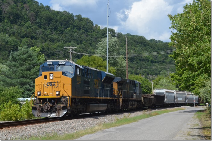 CSX 8904 SD70ACe-T4 with CSX 565 leads Q692 at Betsy Layne KY on 07-18-2020.