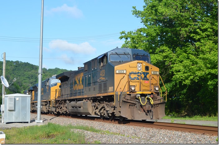 When Q692 rumbled by on this quiet Friday afternoon after work I bolted into action and rushed down to Betsy Layne, a guaranteed afternoon lighted shot of a westbound (heading north). CSX 403 is followed by SD70ACe-T4 8909 and 828. CSX 403-8909-828. Betsy Layne KY.