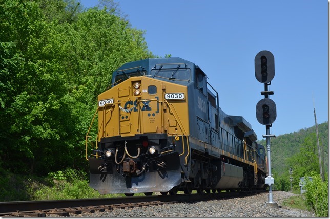 CSX 9030-7924 depart with 47 empty ballast hoppers. View 2. 