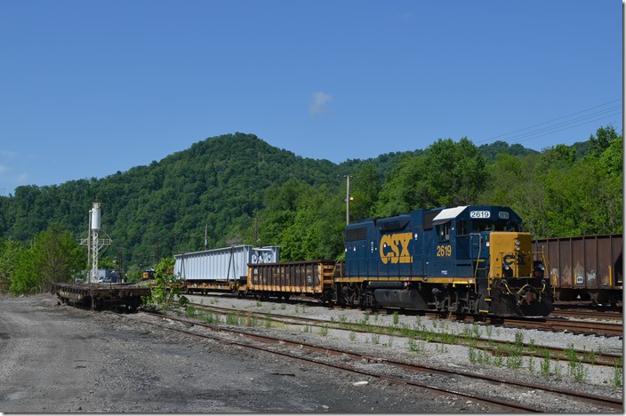 Work train headed by GP38-2 no. 2619. That’s a C&O flat car on the left. Been there for years. 