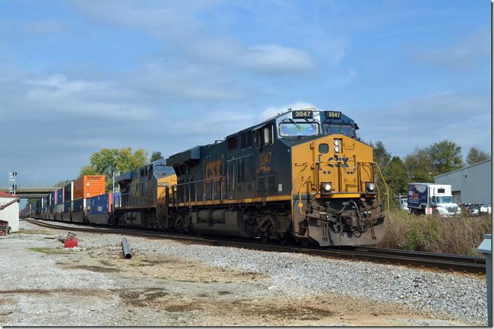 CSX 3047-5472 thundered by with 172 cars of a combined intermodal and loaded multi-level train headed to Nashville. Memphis Jct KY. 10-20-2020.