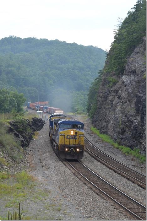 I overtook stack train Q136 near White Sulfur and beat it to Moss Run. Amtrak No. 51 was rolling up the mountain at 5:00 PM when I got there (no shot), so Q136 was held at East Alleghany. At 5:36 Q136 braked down the hill behind 7875-7537 with 388 axles.