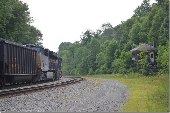 T051 is picking up speed at West End (0.5%) and the pusher throttles down. West End Tower has been closed many years, but I’ve visited the operators there. CSX pusher 3254-780 West End WV.