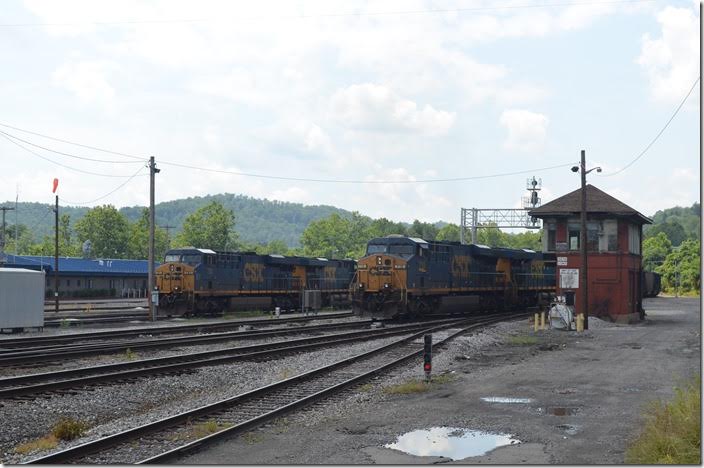 Just as I arrived in Grafton in the early afternoon, this coal train was pulling slowly under the highway bridge off the Fairmont SD. That gave me a minute or two to get this photo of T051-24 eastbound passing D Tower. On the left is the yard office. CSX 719-720. Grafton WV.