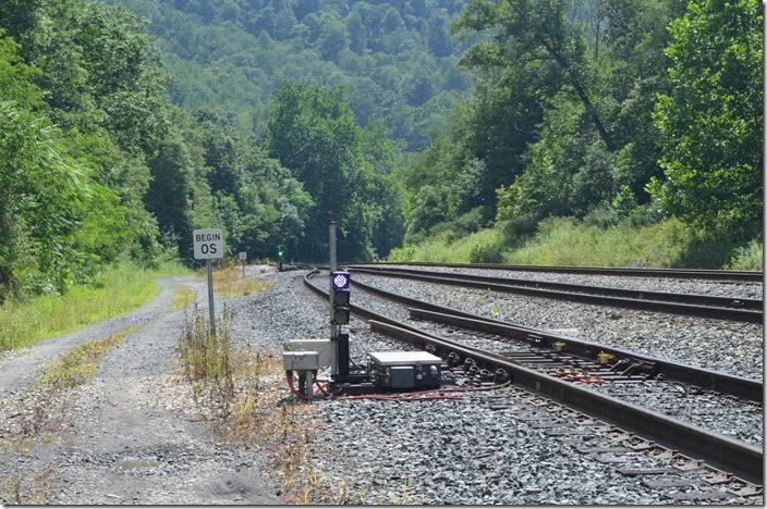 Looking west, the green dwarf is a “Power Assisted Switch” off the main line to the Leer Mine siding. The crew can align this switch with a code on their radio. I would see it in use the following Sunday. CSX derail dwarf E Grafton WV.