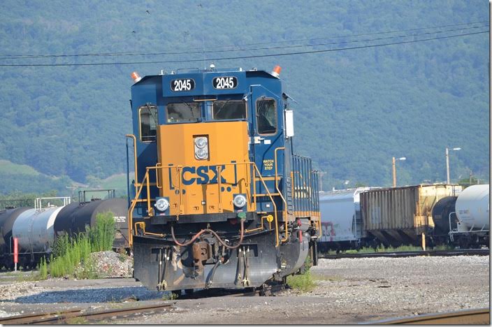 These rebuilt GP38s and 38-2s are used on locals and in yards. CSX 2045. View 3. Cumberland MD.