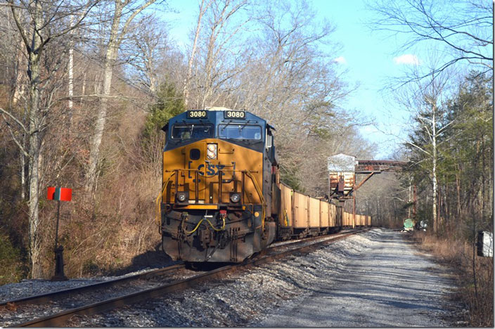 C604 has just about finished loading its 110-car train with CSX DPU 3080. The engineer is still on CSX 547. NRG. Dione KY.