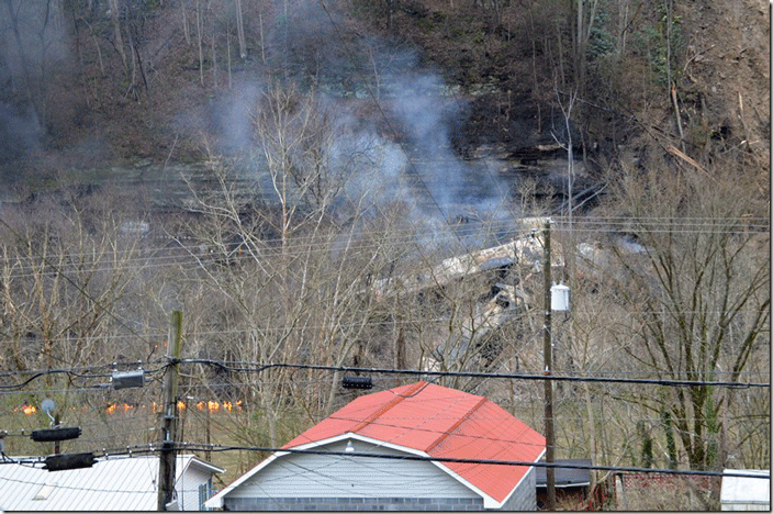 The Federal buffer car is above the fire on the left. Reports say they were loaded with sand. The only Federal cars I’ve shot were big wood chip hoppers in North Carolina. The only buffer cars I’ve seen were covered hoppers. The remainder of the train was pulled back to Shelby.