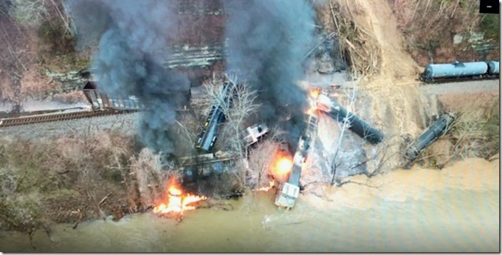 This is a poor quality drone shot taken late in the day of the 02-13 derailment. CSX 168-571-384 plowed into the slide. This occurred after days of heavy rain. The fire was a conflagration after the derailment about 7:00 AM. CSX 168 etc. CSX derailment. Draffin KY. 