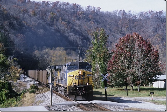 CSX 167-217 heads shifter C881 (Martin-Shelby Shifter) with 98 GACX loads at Titan Siding (Island Creek Road) near Pikeville.
