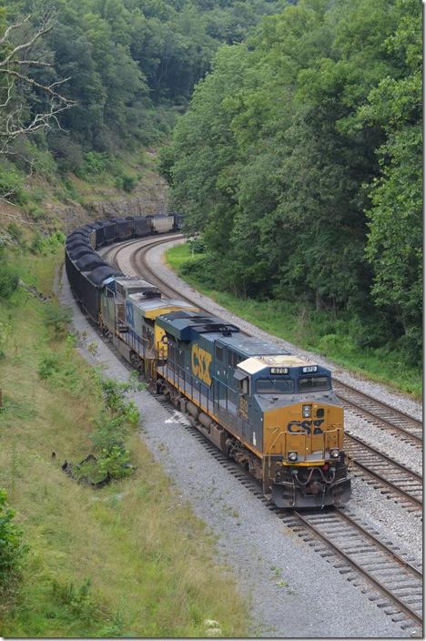 CSX 870-223 e/b N730-30 (Leer Mine – Consol coal dock Baltimore) is parked at the east end of the Leer Mine siding under the US 50 bridge at Thornton WV. This train departed a couple of hours later. Thornton WV.