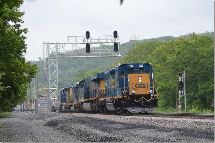 CSX “GP38-3” 2046 with 3159-2272-6479 hustles 51 cars of D787-28 (Cumberland-Brunswick local) west. No. 2046 was rebuilt from an older GP38-2. CSX 2046-3159-2272-6479. Green Spring WV.