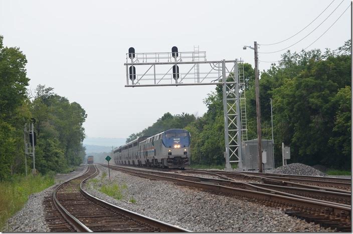 Amtrak No. 30 is due out of Cumberland at 9:20 AM. It is now 11:20 AM at Green Spring (14 miles east of Cumberland), so it is running an hour or so late. P030 has 9 cars. Amtrak 152-822. Green Spring WV.
