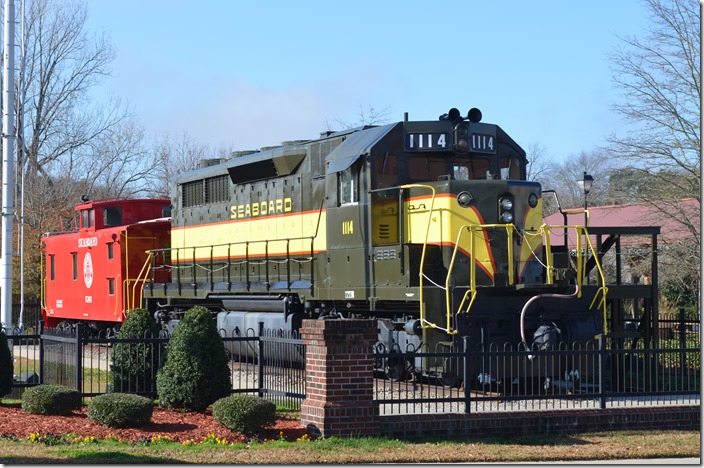 Former SAL SDP35 1114 and a caboose 5241 are on display across the street from the Hamlet Depot & Museum. Hamlet NC.