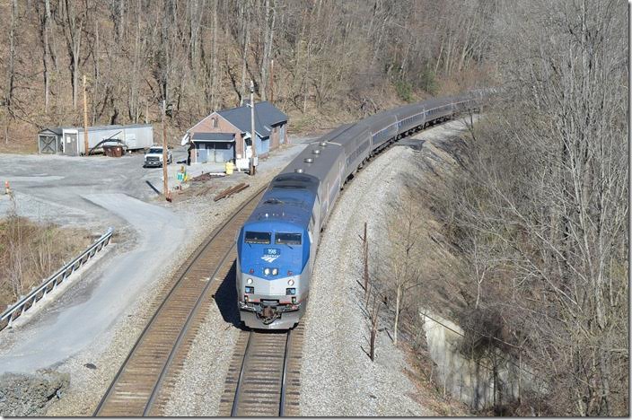 Amtrack engine 198 has No. 50 and 8 cars at 10:13 AM passing the old C&O depot at Cotton Hill.