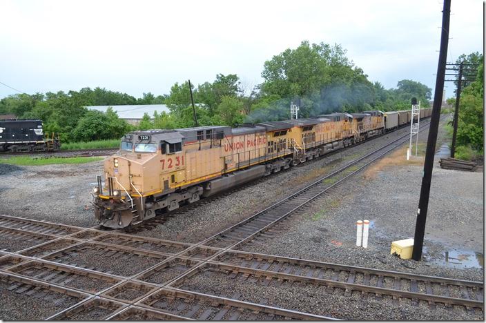 UP 7231-7002-5595 heads west on the CSX Indianapolis Line SD (former NYC-Big Four) with CMO and UP empties. Marion.