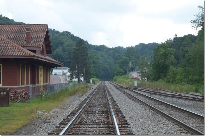 The switch and weed-grown track on the right was the West Virginia Northern. Originally it was the main line through the old Kingwood Tunnel down around the curve. CSX depot. View 3. Tunnelton WV.