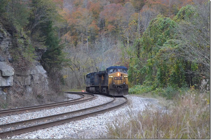 C842 comes slowly down the siding. The turntable pit is on the right. CSX 593-39. View 3. Dent KY.