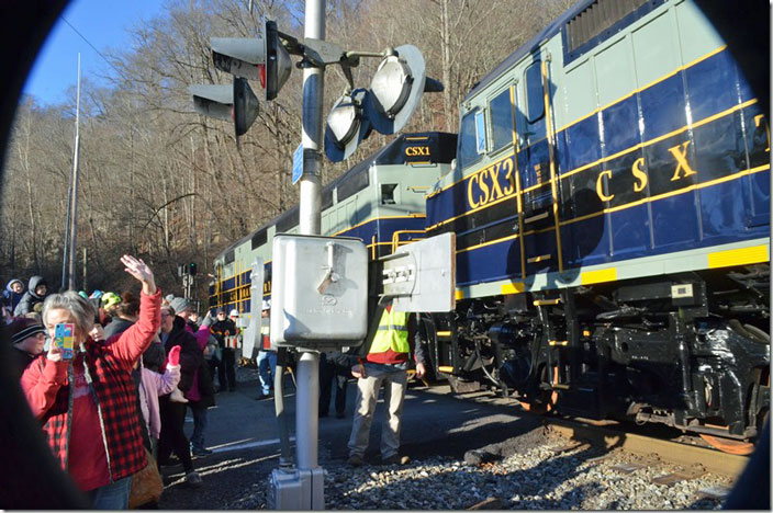 I had the lens opened to full wide angle but forgot to remove the filter! CSX employees are on hand to ensure safety. Clear on the signal. CSX arrives Clinchco.