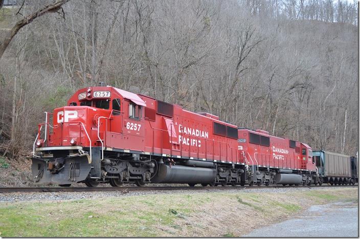 CP SD60s 6257-6242 on petroleum coke train K227-01 (Chicago Bensenville Yard – Rincon, GA) is parked on Track 1 at Fords Branch.