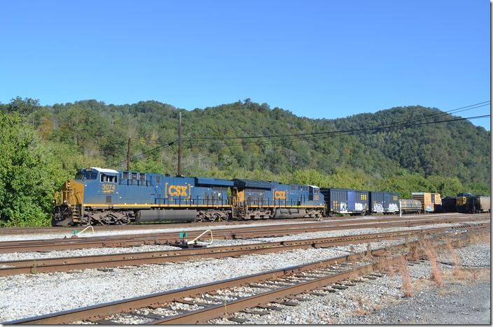 Q697 waits to depart with CSX ES44AH 3074 and CSX ET44AH 3260. Shelby.