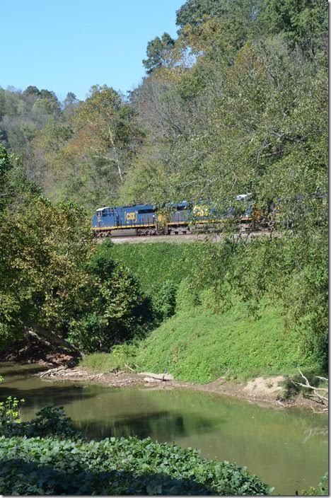 CSX 977-5230 have finished loading their train at the Typo load-out near Hazard and await a crew. That’s the North Fork of the Kentucky River in the foreground, and this is the former L&N Eastern Kentucky Subdivision. 09-30-2017. Typo KY.
