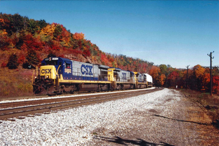 1992. Fall. CSX 5892 in lead. Top of Sand Patch grade.