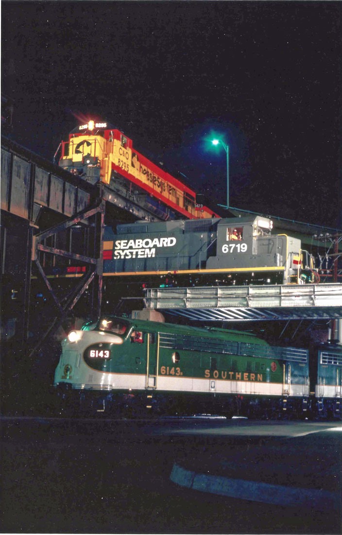 1983. C&O 8295, Seaboard 6719, and Southern 6143. Elevated crossings. Richmond VA.