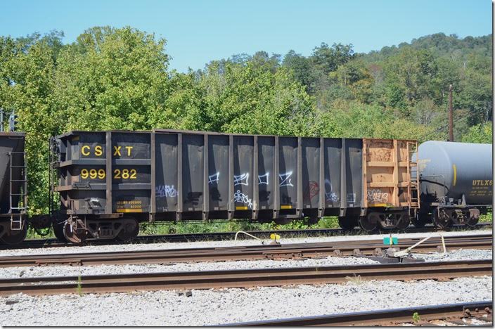 CSX 999282 is an old coal gon relegated to scrap tie service. Shelby KY.