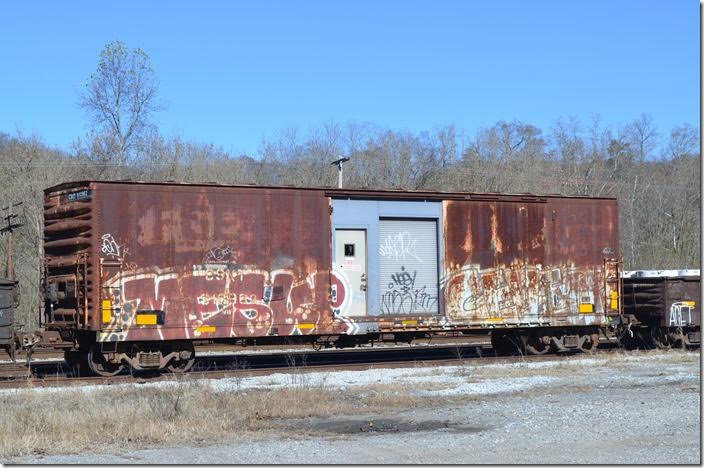 CSX MofW material boxcar 910962 has the old Fruit Growers Express logo showing through the rust. Remember when C&O camp and tool cars where painted green? Ah, those were the days. Shelby KY. 11-17-2017.