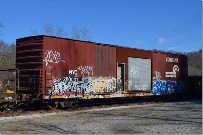 This former Conrail box car is now numbered NYC MW 280031. Wonder why it wasn’t given a 900000 number in the MofW series? It was built in 1965. The old New York Central had many of this type of cushion under frame car for service to the automobile industry. Shelby KY.