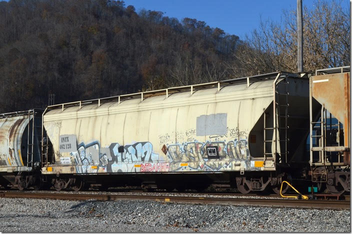 INTX (Interstate Commodities Inc.) covered hopper 462128 is arriving Shelby KY eastbound 11-16-2018 on a loaded grain train. It is ex-CSX and was built 11-1976 with a load limit of 200,100 lbs. Shelby KY.