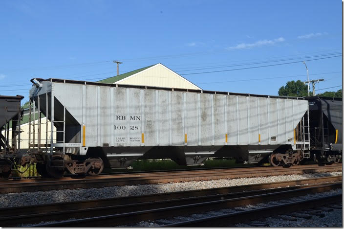 RBMN covered hopper 10028 was built 10-1979 and has a load limit of 196,500 lbs. Lynchburg VA.