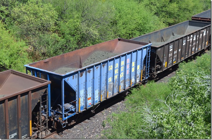 SP hopper 465228 is carrying copper concentrate from ASARCO’s Mission Mine at Saharita AZ, to the smelter at Hayden AZ via UP and Copper Basin. Kelvin AZ, 04-25-2019. Kelvin AZ.