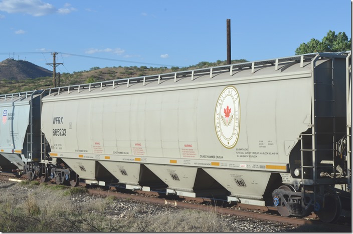 WFRX covered hopper 865233 has a volume of 6580 cubic feet. Nogales AZ.