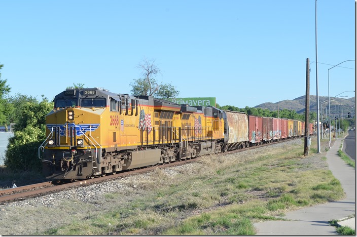 Later we met UP 2668-6770 freight leaving Nogales toward Tucson on the former Southern Pacific. Luckily he was moving slow enough leaving this border town that we were able to get ahead in the busy traffic. Nogales AZ. 04-26-2019.
