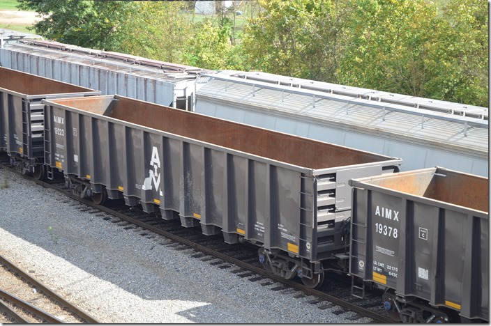 AIMX gons 19223 and 19378 were built in Hamilton, Ontario CA by National Steel Car during 2019. They look like coal gons from the 1970s, but they are already dented from hauling scrap. Fulton KY.
