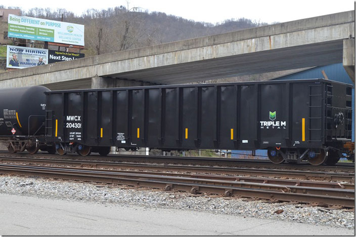 MWCX (Midwest Railcar Corp.) gon 204305 on a NS freight at Williamson WV 03-25-2022. 4014 cubic feet in volume. Built by Greenbrier Companies 01-2022.
