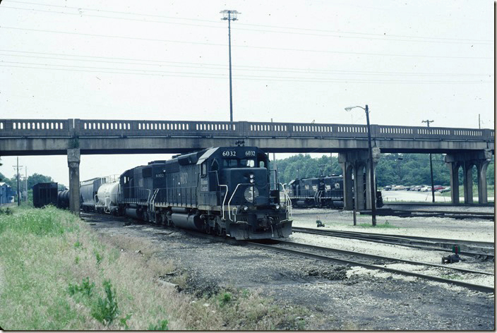 IC 6032-6102 are stopped with a southbound freight near the yard office awaiting a crew. SD40-2 6032 was the last new locomotive ordered by ICG in 1975. IC 6102 came from the Burlington Northern. 05-23-1998. IC Fulton KY.